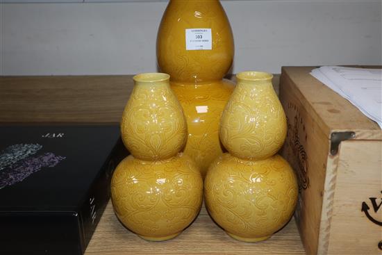 Three Chinese yellow ground vases Tallest 35cm